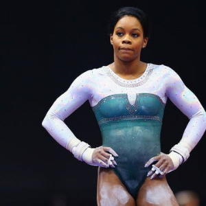 Gabby Douglas standing in Olympics.