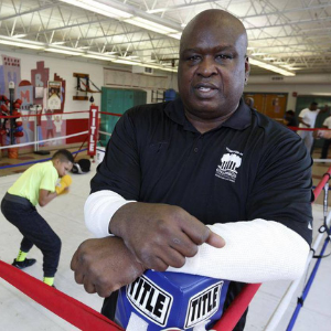 James "Buster" Douglas standing in a boxing ring.